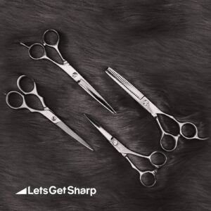 Grooming scissors on fur background after sharpening